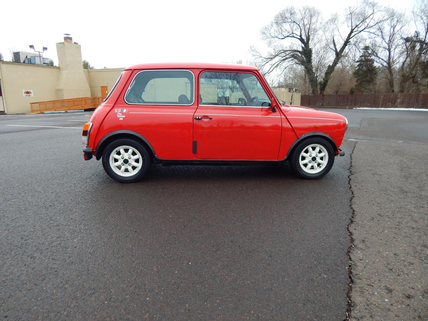 1981 RED /Black Cloth Austin Mini Cooper (AA25AU11248) with an 1275 CC engine, 4 speed manual transmission, located at 6528 Lower York Road, New Hope, PA, 18938, (215) 862-9555, 40.358707, -74.977882 - Very cool, great driving 1981 Austin Mini-Cooper. We believe it is a 1981 due to the rear taillights. The title shows it as a 1969 model year, however the cars built in the 1960s had outside door hinges. Also , the windows were sliding instead of the roll up windows this vehicle has.. Red/ whit - Photo#6